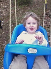 Theodore loves to spend time on the swing at Grammy's