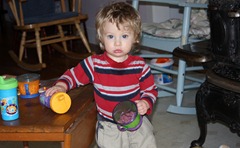 Theodore doesn't appear to happy to be photographed while enjoying his snack.