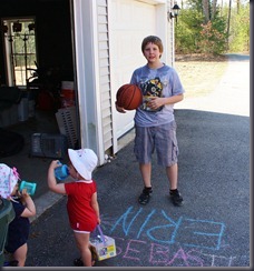 Sebastian gets home from school to find everyone outside already. We had been outside for about two minutes. Obviously the twins were already thirsty.