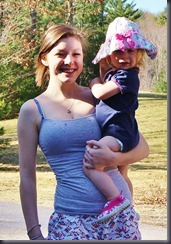 Erin and Jacqueline. Jax doesn't really like the sun or the bright sky. She hid under her hat.