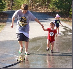 The boys approach the water again. Jacqueline assumes her supervisory position, although I am not sure what she can see.