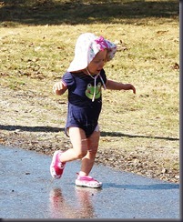 Jacqueline makes a run for it. She was avoiding the water but still got a little bit wet.
