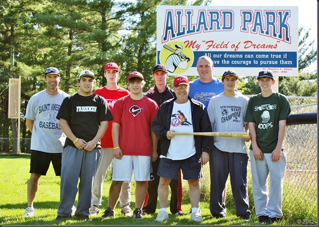 Dr. Moe and the group showing off the bat at Allard