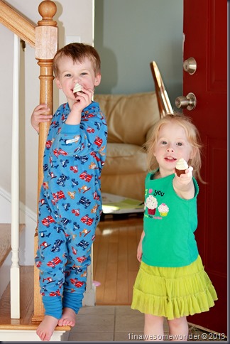 The twins show me their flashlights. Toy cupcakes that they have imagined to be flashlights.