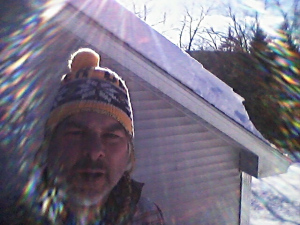 Super Dad! while still in work mode. The blowing snow with the sunny backdrop made for some cool effects on this picture. (photo by 1inawesomewonder) 