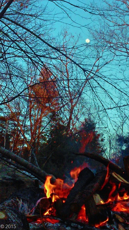 The moon climbs a little higher while I enjoy the warmth of the flames.