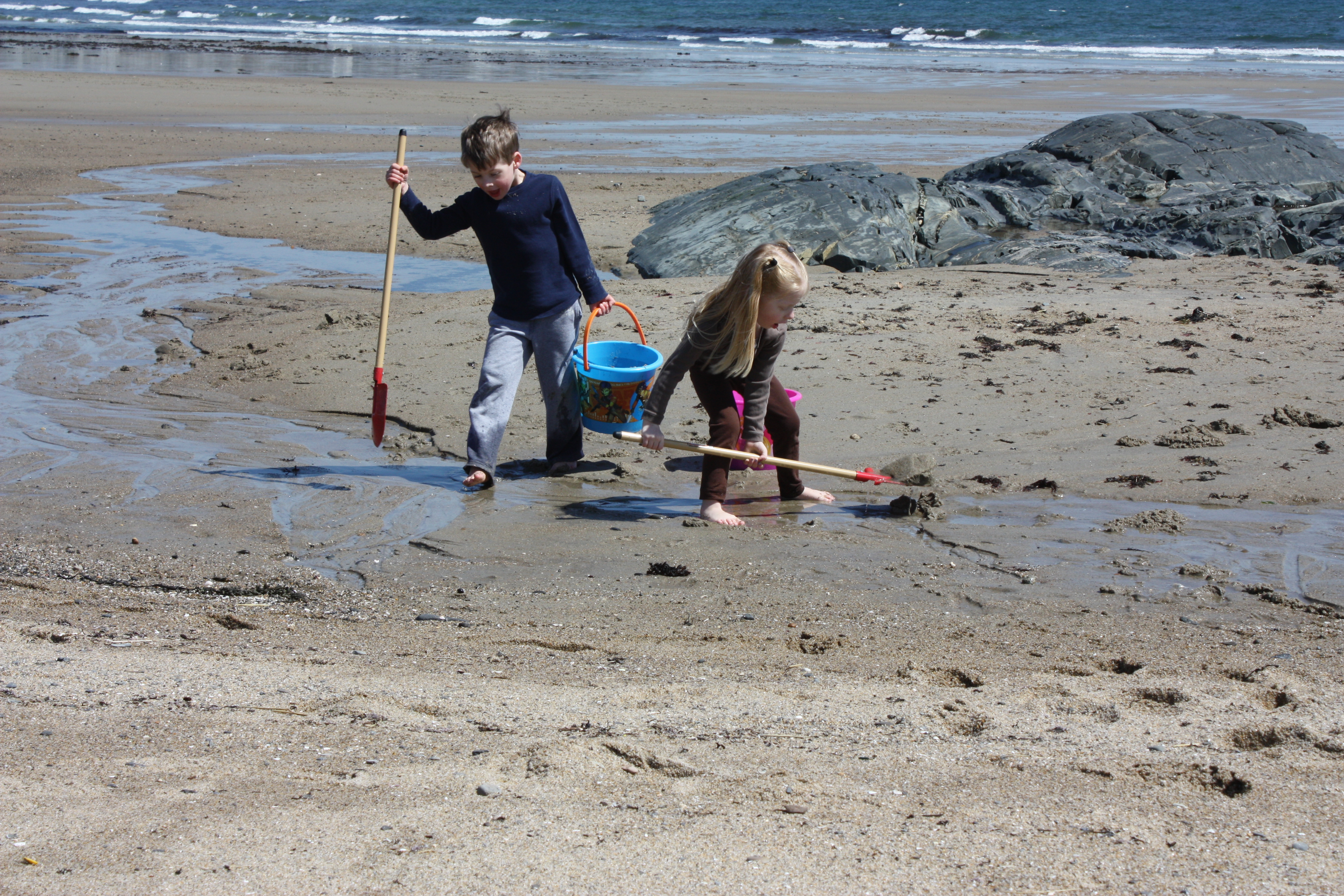 The temperature was only 62 on the coast, with a strong wind, but the twins were busy