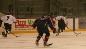 Alex McCarthy and Griffin Cook charge up ice against HBD. (c) 1inawesomewonder. (Photo by Charron)