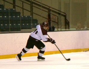 Jake Noonan makes a pass from his point position. (c) 1inawesomewonder. (Photo by Charron)
