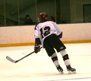 Mike Fortin looks to make a play against the Warriors. (c) 1inawesomewonder. (Photo by Charron)