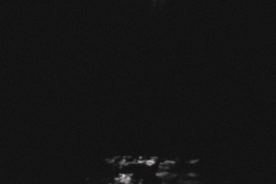Midnight moonlight reflects on a mountain brook